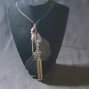 Feathered necklace.